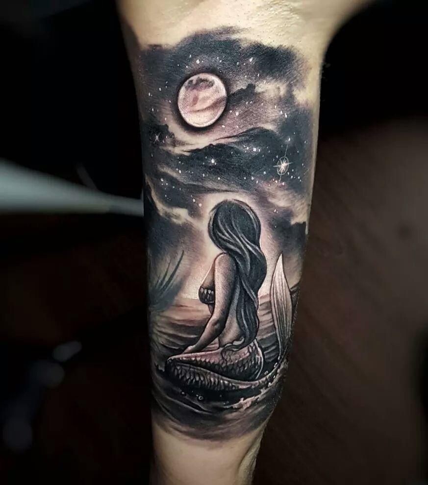 Black & White Mermaid Tattoos That Speak Volumes