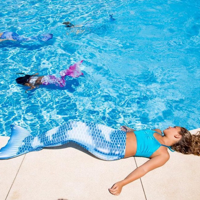 fin fun with planet mermaids at swimming pool